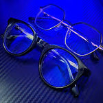 Eyeglasses on a blue textured surface