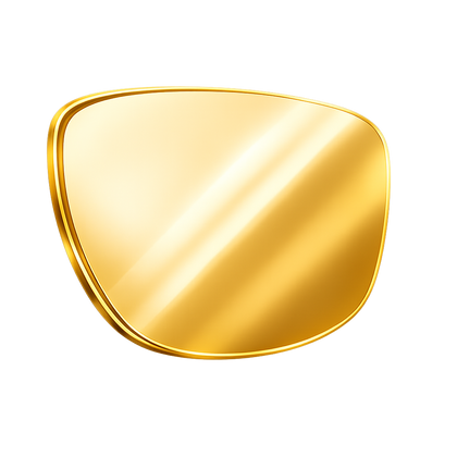 A gold shield-shaped eyeglass lens with a polished, reflective metallic finish, isolated on a white background.