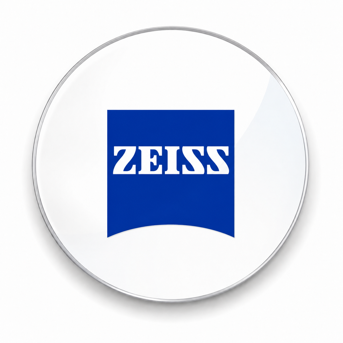 A circular white button or badge with a silver-toned border, featuring the blue and white ZEISS logo in the center.